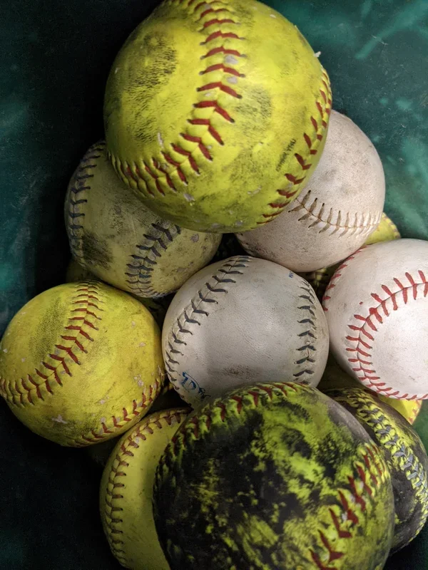 Softballs, Assortment vary, Used. One Piece.